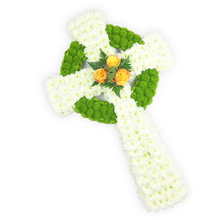 A carefully composed three-dimensional Celtic cross sits on a crisp white background, photographed from a slightly elevated angle to show its sculptural depth and fine craftsmanship. The structure is formed of tightly clustered white spray chrysanthemums, their tiny petals building a tender, cloud-like surface that reads as purity and solace. Strategically worked into that white are lively apple-green button chrysanthemums, their round, compact heads mapping the circular centre ring and alternating bands in the arms to create the iconic Celtic motif - a visual nod to knotwork and continuity. Nestled exactly at the intersection of the arms, a trio of bright orange-yellow roses forms the poignant focal point: warm, open blooms whose golden hues draw the eye and provide an emotive pulse against the cool palette. Dark green fern sprigs cradle the roses, adding shadow, contrast, and a whispered scent of greenery. The gentle, even lighting highlights both the plush texture of the chrysanthemums and the velvety sheen of the roses, producing a design that honours tradition while feeling current. Locally, Canonbury families often choose this style for memorial services at nearby chapels or for special tributes delivered across Essex Road and Upper Street. At Canonbury Flowers we hand-assemble each cross with that same attention to balance and tone, mindful of the quiet comfort such a piece brings to mourning loved ones and of its gentle reference to Irish roots when requested.