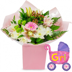Set against a clean white background, this new baby girl floral gift set feels like a gentle celebration captured in a single image. A tall, pale-pink gift box takes centre stage, its edges softened by layers of crinkled blush tissue paper and glistening clear cellophane that cradle a generous, hand-crafted bouquet. At its heart, a vivid pink gerbera daisy draws the eye, its velvety petals forming a perfect halo of colour. Around it, snowy white chrysanthemums create a pillowy base, each flower composed of countless fine petals that add a sense of softness and comfort, like a cosy nursery blanket. Slender stems of light pink and white speckled alstroemeria weave through the arrangement, some blooms fully open, others just unfurling, while creamy yellow lily buds rise slightly above the rest, hinting at fragrance and beauty still to come. Nestled between the blossoms are clusters of bright green textured button flowers, providing playful contrast, and rich red hypericum berries that introduce a deeper, jewel-toned accent. Polished dark green leaves and delicate ferns spill over the sides, suggesting the freshness of flowers sourced that same morning, perhaps on a route through Canonbury's residential streets toward Upper Street. The bouquet feels both abundant and thoughtfully composed, like something crafted by Canonbury Flowers for a proud family welcoming their little girl. To the right, a gleaming foil balloon in the shape of a classic baby stroller adds a cheerful finishing touch. Its body is a vibrant pink, topped with a purple hood and matching purple wheels adorned with multicoloured spokes. Bold yellow and green letters spell out It's a Girl!, with tiny pink hearts echoing the joy. The overall impression is one of tender excitement, perfect for baby showers, hospital deliveries, or first days at home in Canonbury.