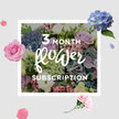 A softly romantic bouquet from a three-month flower subscription is pictured here, its colours and textures unfolding like a quiet morning in Canonbury after rain. At its core, plush heads of pale blue hydrangea create a generous base, their rounded forms and densely packed petals offering a cool, serene presence. Surrounding them, roses in shades of blush pink and gentle lavender open at varied stages, giving the arrangement a sense of movement and time, as though each bloom is telling its own part of the story. Threaded between these are slender stems of lisianthus, some tipped with delicate, frilled blossoms, others still in tight, elegant buds, lending a whimsical, almost weightless quality. Leaves in layered greens encircle the flowers, some glossy, some softly matte, shaping the bouquet into a full, hand-crafted form that feels both polished and natural. The lighting is bright yet tender, illuminating the pastel tones and catching the edges of each petal so they seem to glow faintly, like windows along Canonbury Square at dusk. This is the kind of arrangement that would sit comfortably on a reading desk, bedside table, or kitchen counter, quietly transforming the space with its presence. Over three months, similar bouquets would arrive, each a gentle variation on this theme of comfort and renewal. Together they would weave a small ritual into daily life: the doorbell, the rustle of paper, the release of soft fragrance, and the simple pleasure of placing fresh, expertly arranged flowers into a favourite vase.