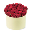 Canonbury Flowers presents this exquisite red rose box, a luxurious round container carrying a dense bouquet of two dozen or more velvet-crimson blooms. The petals are tight and glossy, arranged to form a slightly domed surface that fills the pale cream box completely, with no stems or leaves visible at the top. Greenery peeks sparingly between the heads, providing a natural accent to the deep red. The box's matte finish adds a modern, premium edge to the classic hat-box silhouette, making it a thoughtful gift with high-impact presentation.
The scene is set on a clean white background, photographed from a gentle elevated three-quarter angle that draws the eye to the careful handcraft and the luxurious pairing of red roses and cream container. This is a perfect choice for romantic occasions, anniversaries, or celebrations, and it's available for same-day delivery across Canonbury and surrounding Islington neighborhoods. For readers seeking refined gifting, this arrangement conveys passion, commitment, and timeless elegance, delivered with the care you expect from Canonbury Flowers.
With every petal placed by a seasoned local florist, the bouquet radiates warmth and fragrance, inviting you to lean in and imagine the bouquet's soft scent and tactile velvet texture. The composition blends classic romance with contemporary packaging, an ideal feature for articles about luxury flower delivery or premium gifts in Canonbury. It speaks to lovers, friends, and admirers alike, a showpiece that arrives fresh, elegant, and ready to delight.