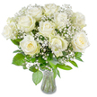 A serene, luminous bouquet of large, fully opened white roses fills the frame, each bloom showing soft, velvety petals that spiral outward in satin-like layers. Several roses reveal a faint creamy-yellow wash at their tightly furled centres, lending gentle warmth to the otherwise pure ivory faces. Interwoven between the roses are airy sprays of baby's breath (Gypsophila paniculata), their tiny clustered blossoms drifting like morning mist and giving the composition a cloud-like softness that cushions the stronger rose forms. Beneath and around the blooms, a variety of lush green foliage fans and frames the bouquet - glossy leaves and matte, textured greens create depth and a lively contrast that grounds the pale petals.

The arrangement is presented in a classic clear glass vase with a slightly flared lip, visible at the lower edge of the picture, where neatly trimmed stems descend into bright clear water. Even, natural lighting bathes the flowers from the front, sharpening the subtle folds of each petal and making the whites appear radiant without harsh shadows. The overall impression is one of quiet dignity and tender comfort - a composition well suited for a wedding aisle, an anniversary table, or a sympathy gesture intended to offer calm and solace. As a local florist familiar with Canonbury and nearby Newington Green, I picture this bouquet placed on a simple wooden table in a north London flat, its gentle fragrance a soft, reassuring presence in an otherwise hushed room.